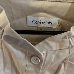 Calvin Klein tan shirt dress with elastic waist.
